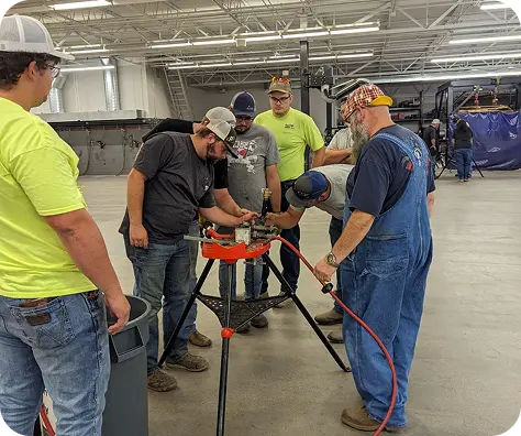 Group of people using equipment