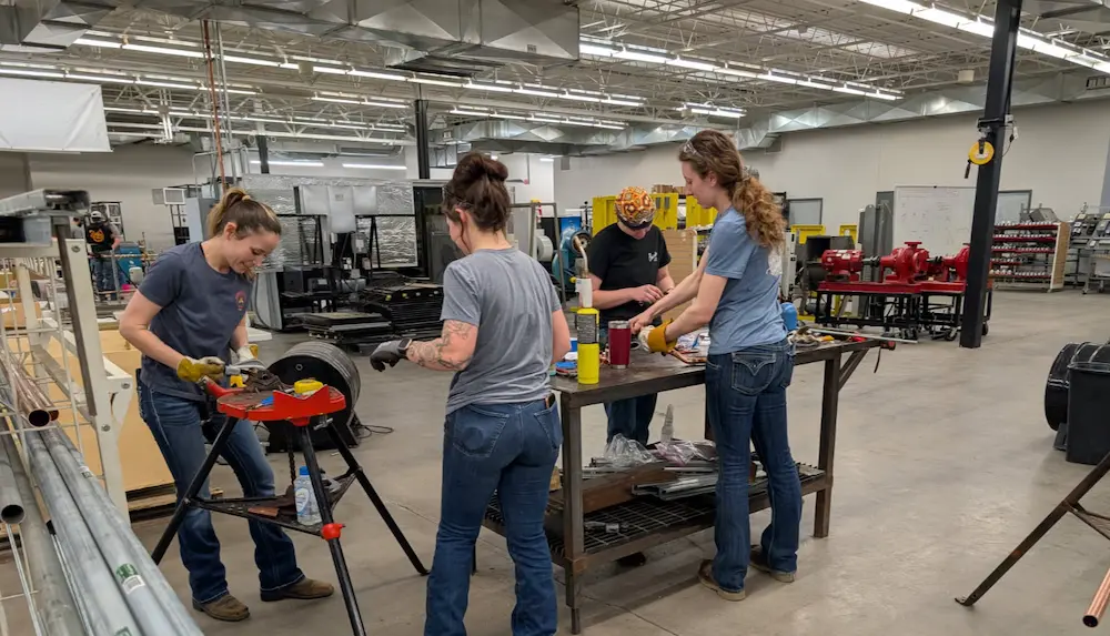Group of women working in a facility building