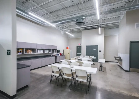 A breakroom with tables and food